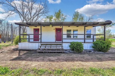 View of front of home featuring covered porch
