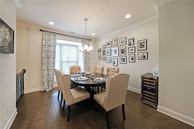 Dining room with wine cooler, dark hardwood / wood