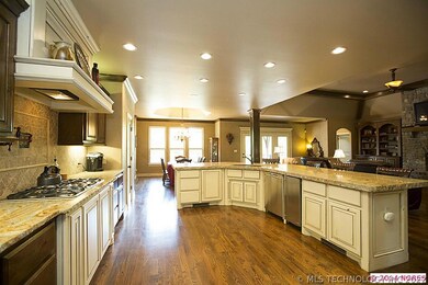 Upgraded back splash, cabinets, and granite...