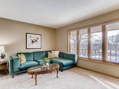 Large windows bring in natural light and showcase 