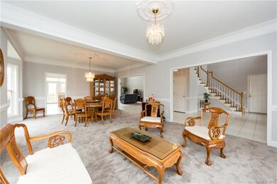 Large sitting area/den with access to dining room