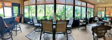 HUGE SCREENED AND COVERED FLORIDA ROOM