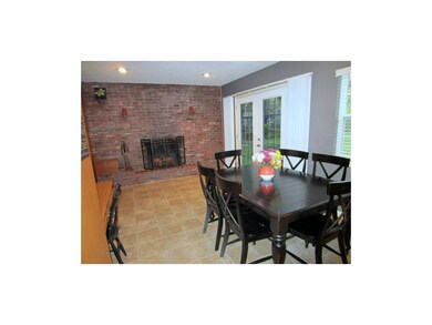 Lovely Hearth Room Off Dining Area