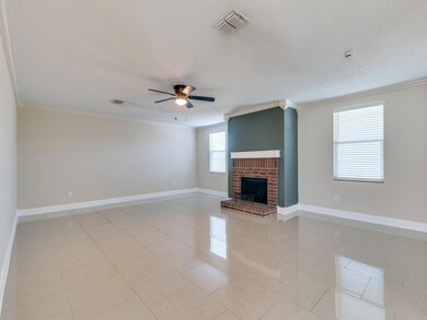Unfurnished living room with a fireplace, a textur