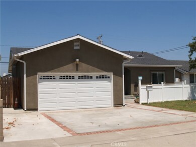 Extra Wide Driveway.  Finished two-car garage.