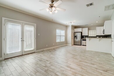 Open concept floor plan with easy to maintain wood