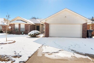 Single story home with a garage