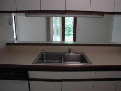 Kitchen with View of Living Room & Patio