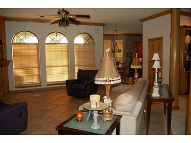 Living Room. Windows and living room overlook acre