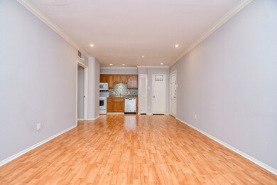 The spacious living area is large enough for den f