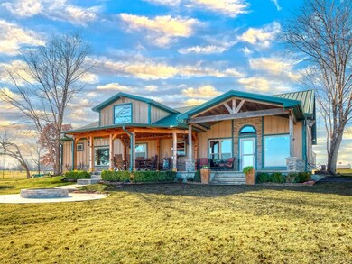 View of front of property featuring covered porch 