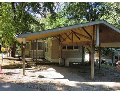 Exterior Front. One & One Half Carport,  Covered  Walkway from Carport to Porch