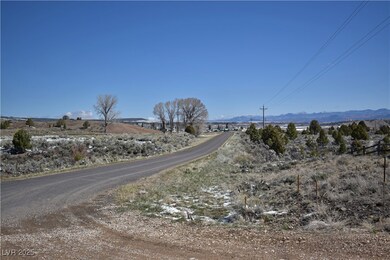 View of asphalt street with a mountain view