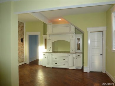 Tons of Open Space...this kitchen, once complete will meet your every desire. Built in Range, Oven, Dishwasher, and Breakfast Bar with Granite Sweeping across.