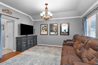 The Formal Dining Room features elegant crown mold
