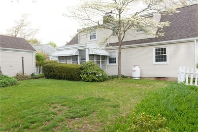 BACK YARD SHOWING REAR THREE SEASON ROOM