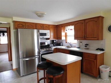 Kitchen with all appliances and center island