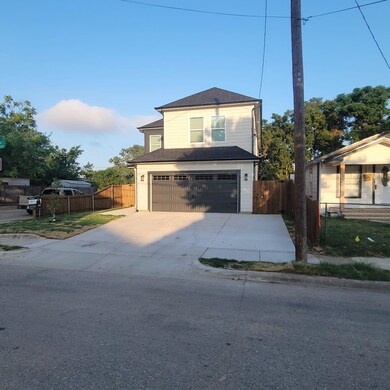 View of front property with a garage