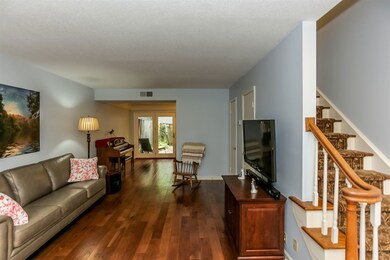 Spacious, warm and inviting great room opens to th