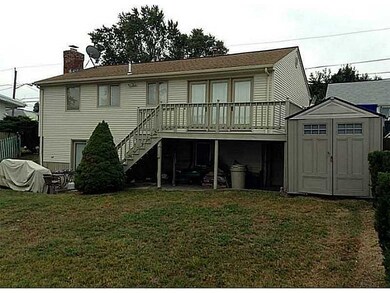 Exterior Back. Storage sheds to remain.