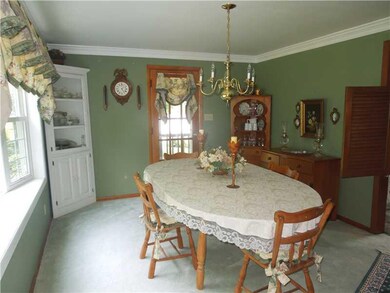 Dining Room. Dining room has crown molding, bowed 