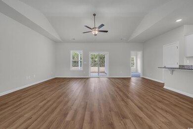 Unfurnished living room with visible vents, basebo
