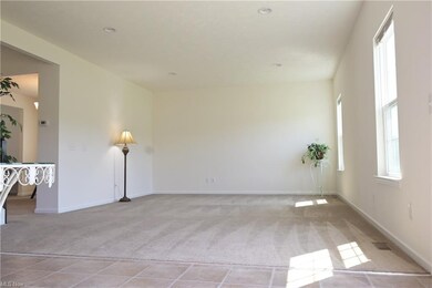 Open & airy great room has an abundance of natural