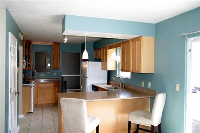 A custom Kitchen with guartz counters, delightful 
