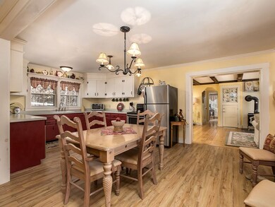 Kitchen flows into spacious living room.