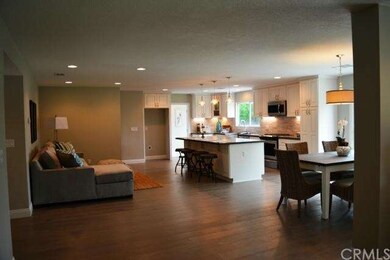 Open Floor Plan.  Living Room, Dining Area, and Fa