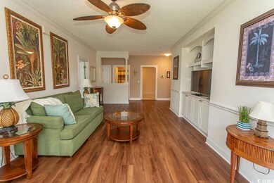 Living room featuring a textured ceiling, ceiling 