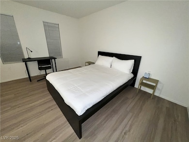 Bedroom featuring wood finished floors