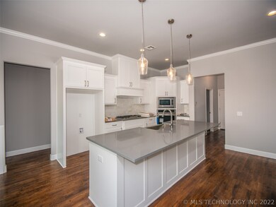 Stunning Kitchen with all white cabinetry and fabu
