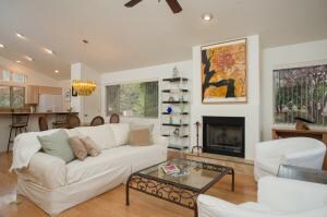 living room with fireplace & dining area