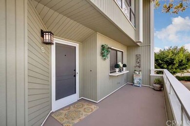 Front entrance patio with kitchen serving bar, sli