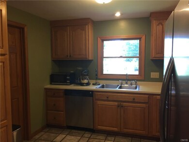 Large kitchen with solid surface countertops