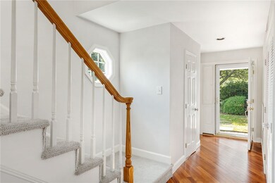 Enter into the foyer which has a nice coat closet