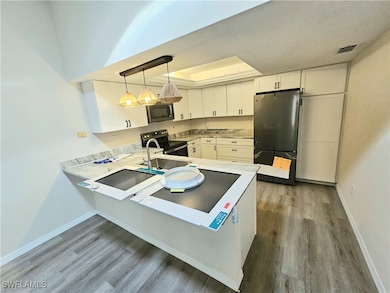 Kitchen featuring appliances with stainless steel