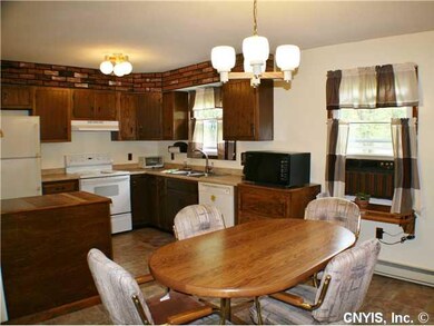 Kitchen. Eat-in kitchen has plenty of workspace.
