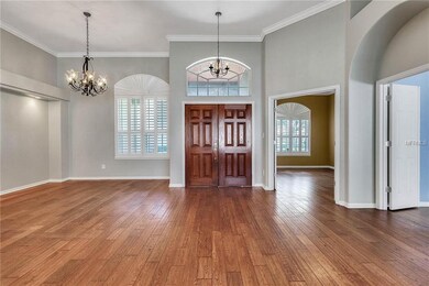 Dinning room off foyer with living area and den.  