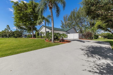 825 Whippoorwill Trail, West Palm Beach, FL 33411 - photo 3