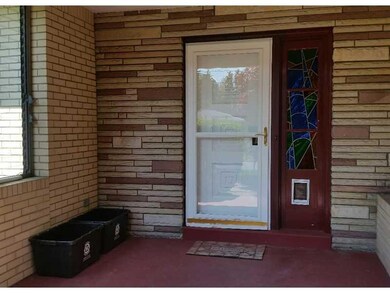 Exterior Front. Front porch, door
