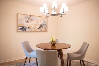 Dining room featuring dark hardwood / wood-style f