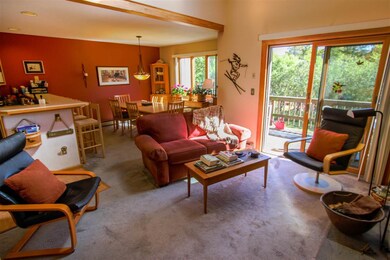 Living room is open to dining area and kitchen
