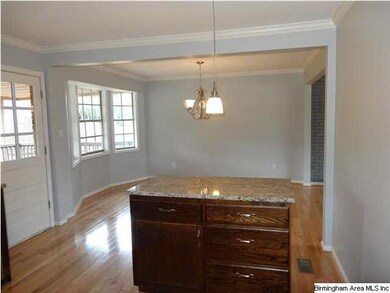 Kitchen with granite and island