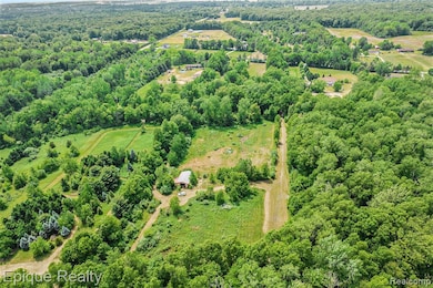 Pole barn on back of property and a fenced area.  Has housed lots of different animals over the years