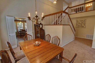 Stairway and entrance to kitchen.  Hall closet con