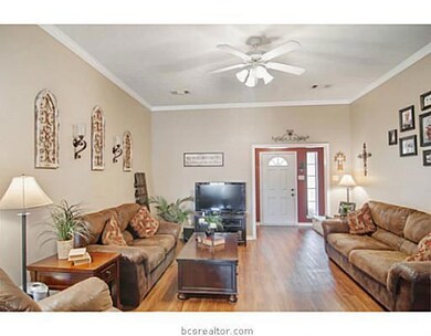 Living Room. Raised ceilings add volume to this inviting living room.