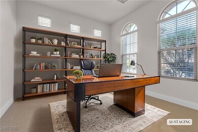 Office space featuring plenty of natural light and light tile patterned floors