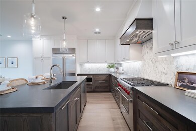 Kitchen featuring decorative light fixtures, high 
